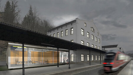 Visionszeichnung eines Bahnhofsgebäudes mit einem ankommenden Zug.