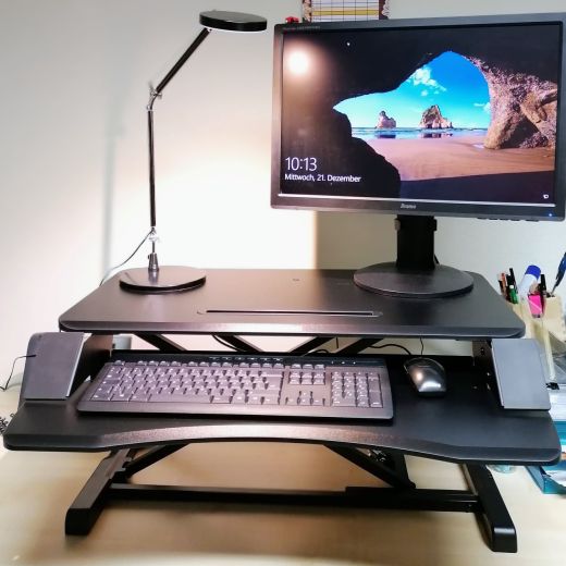 height adjustable workstation elevation with monitor and keyboard