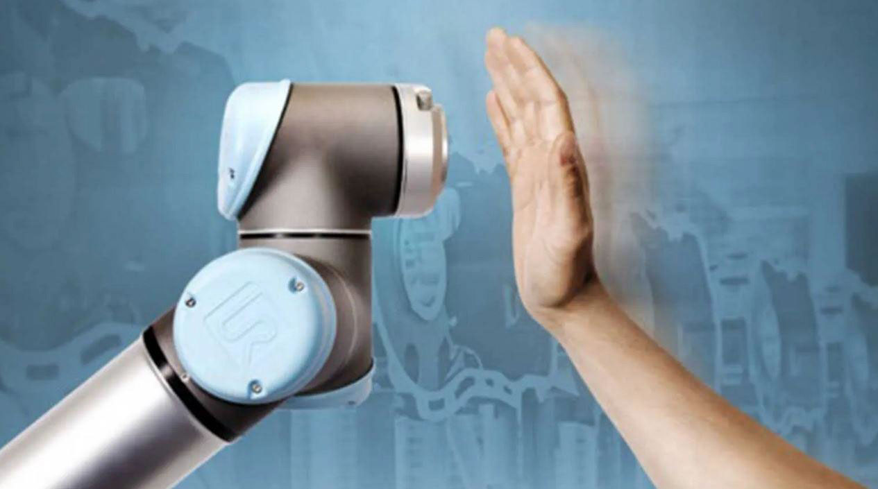 Image showing a robot and human hand.