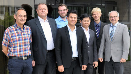 Die vietnamesische Delegation kam auf Einladung von Prof. Andreas Hirsch (rechts) nach Chemnitz.