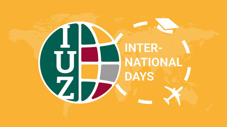 Der Schrifzug IUZ in einem stilisierten Erdball. Rechts daneben steht International Days.