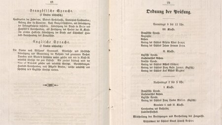 Ein aufgeschlagenes Heft mit Text.
