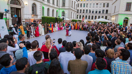 Indian students dance in colorful costumes at the TUCsommernacht in 2017