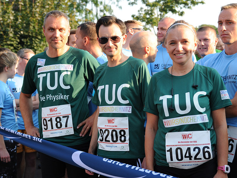 Drei Läufer im TUC-Lausfshirt