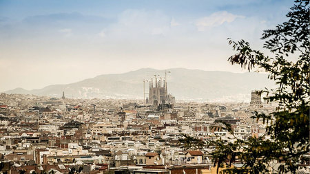 A view over Barcelona with the Sagrada Familia in the center.