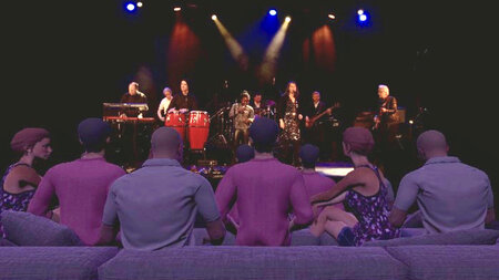 Mehrere Avatare sitzen nebeneinander und blicken auf eine reale Bühne, wo eine Band spielt.